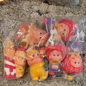 Colorful, fidget “squeezies”. (Set of six).